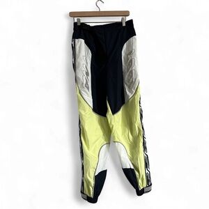 TNA Black and Yellow Graphic Raver Pants